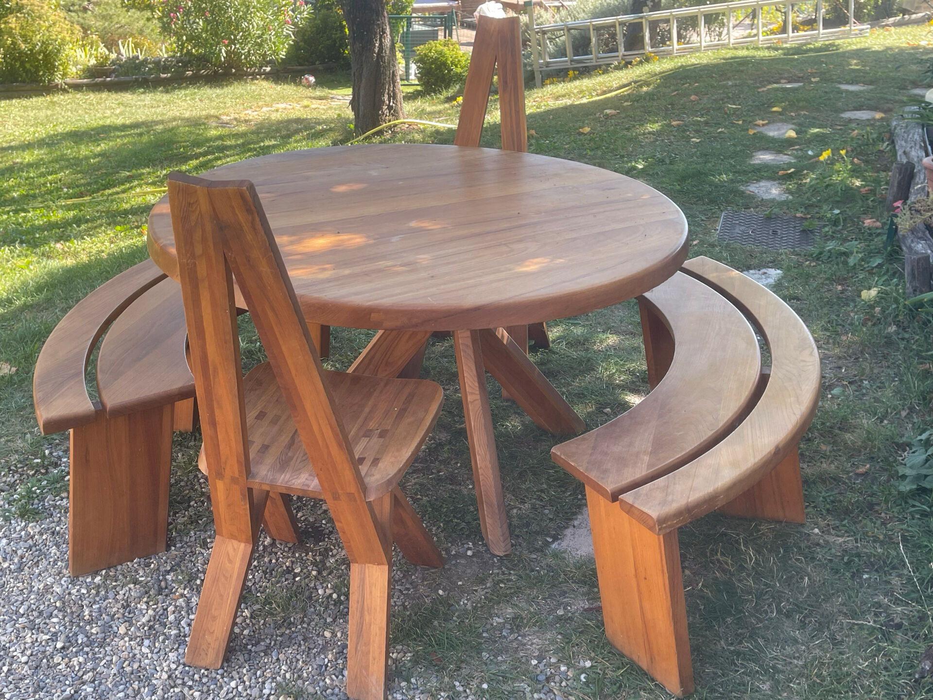 Round table + 2 chairs and 2 rounded benches suitable for the table.
