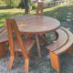 Round table + 2 chairs and 2 rounded benches suitable for the table.