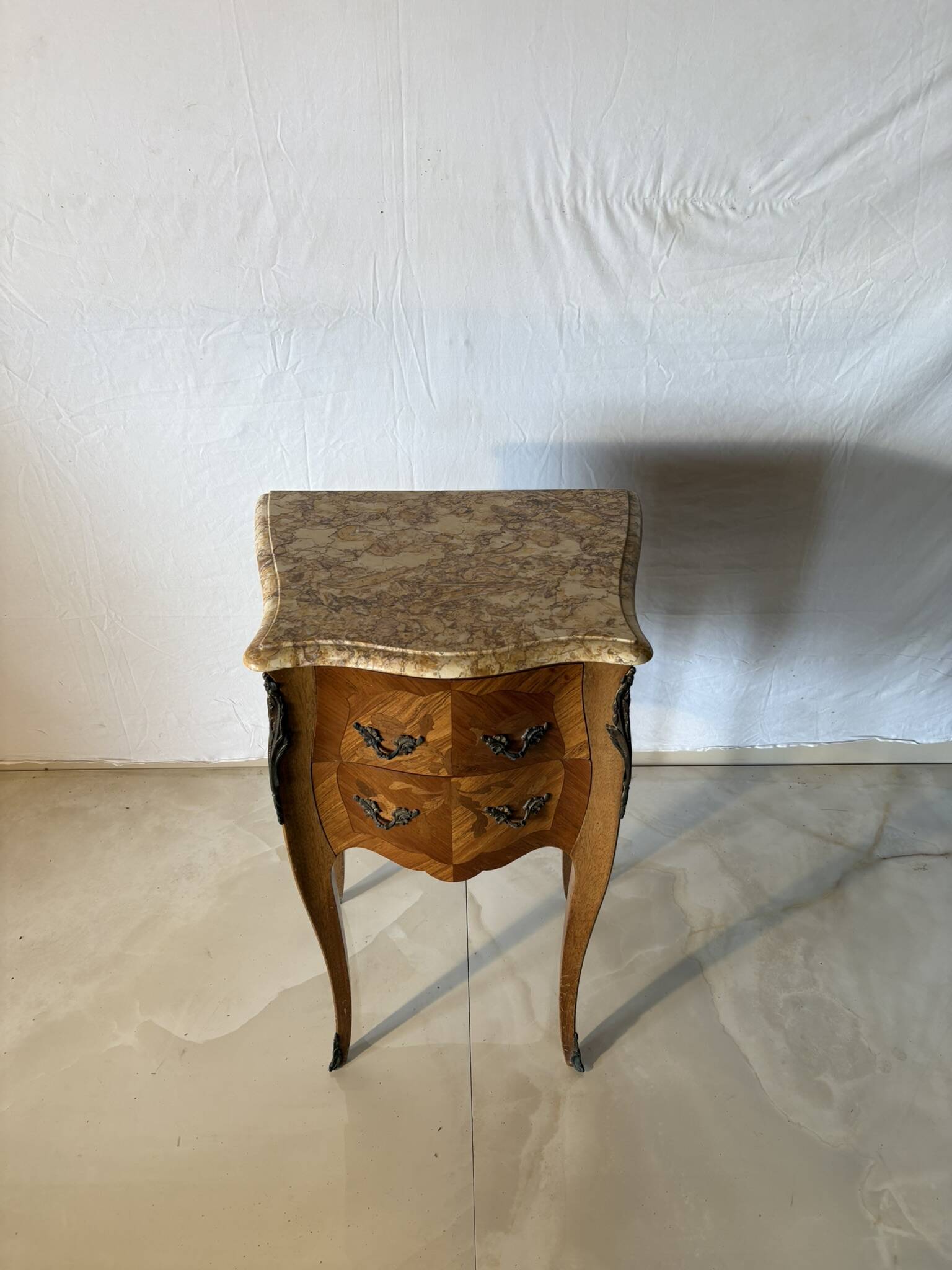 Small curved Louis XV style piece of furniture – marquetry and marble top
