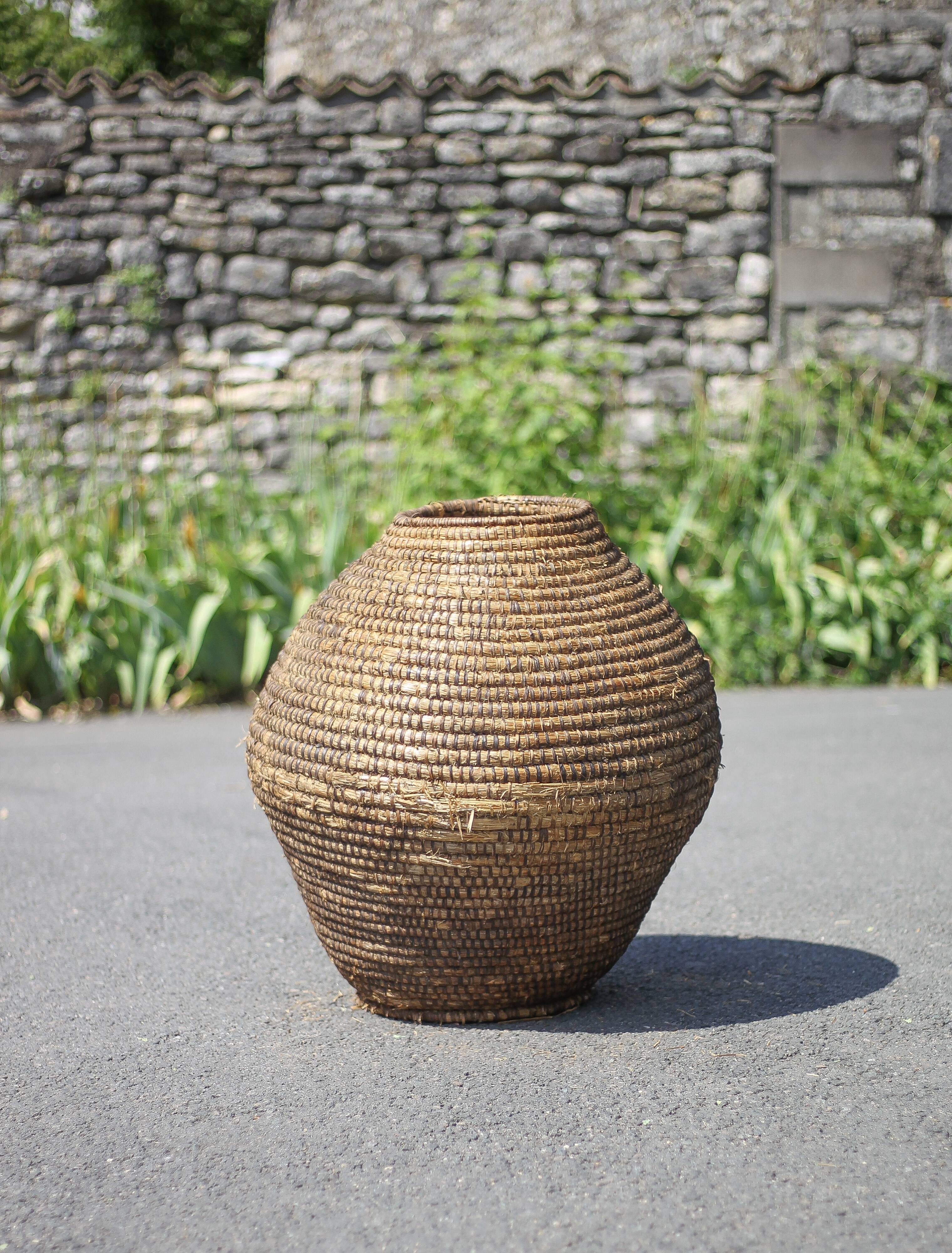 Large old basket, burgundy straw and bramble, woven basket
