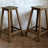 Pair of high workshop stools in raw wood