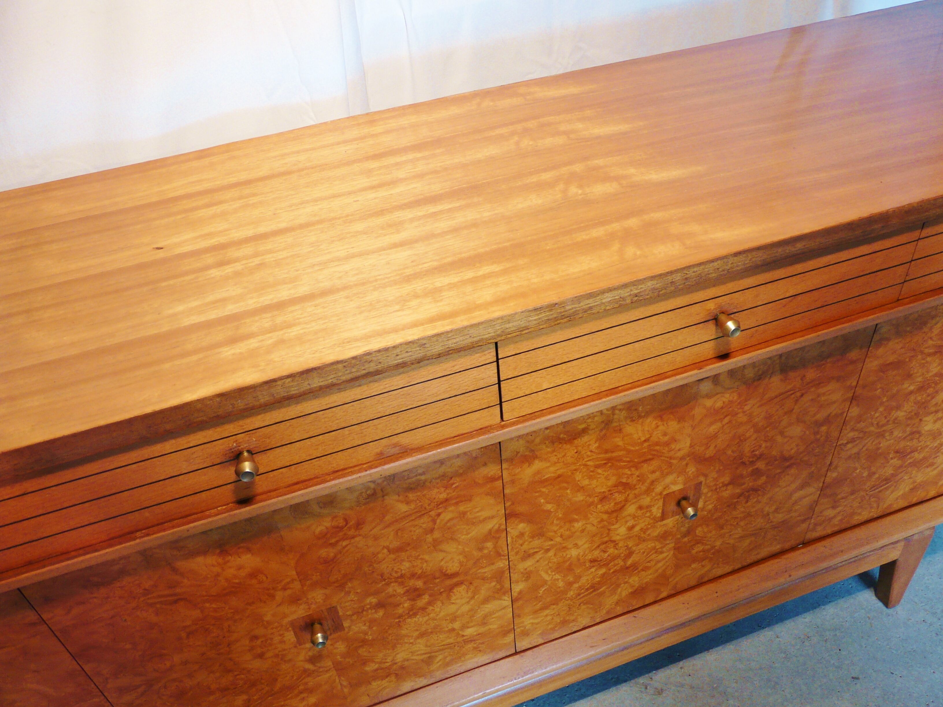 Scandinavian sideboard of blond wood and teak
