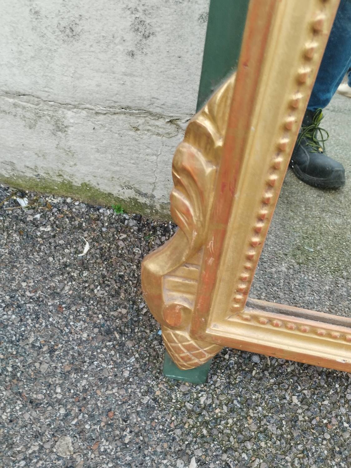 Antique gilded wooden mirror in Louis XVI style