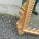 Antique gilded wooden mirror in Louis XVI style