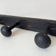 Old wooden wall coat rack