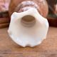 Fluted vase in mottled brown and white glass paste