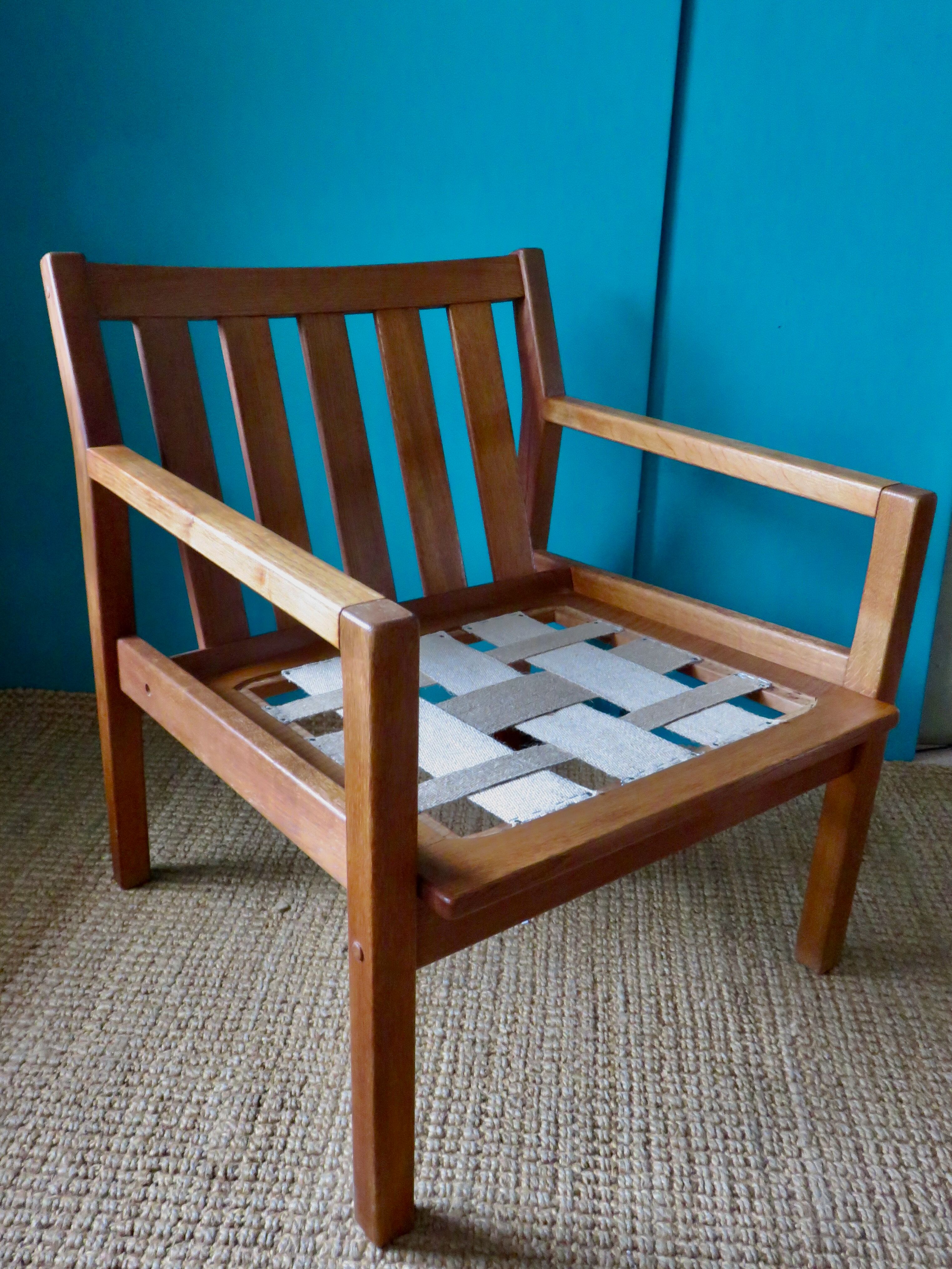 Pair of oak faults with tawny leather cushion. Denmark 1960