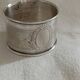 Antique napkin ring in solid silver.