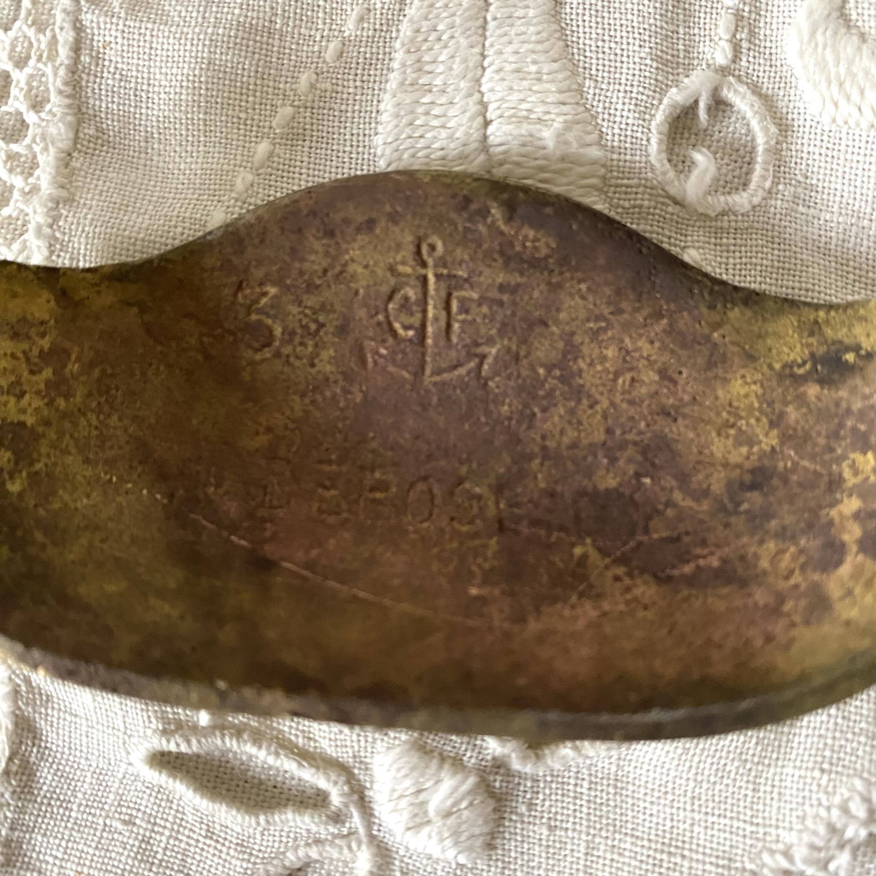 Old shell drawer handle in gilded brass