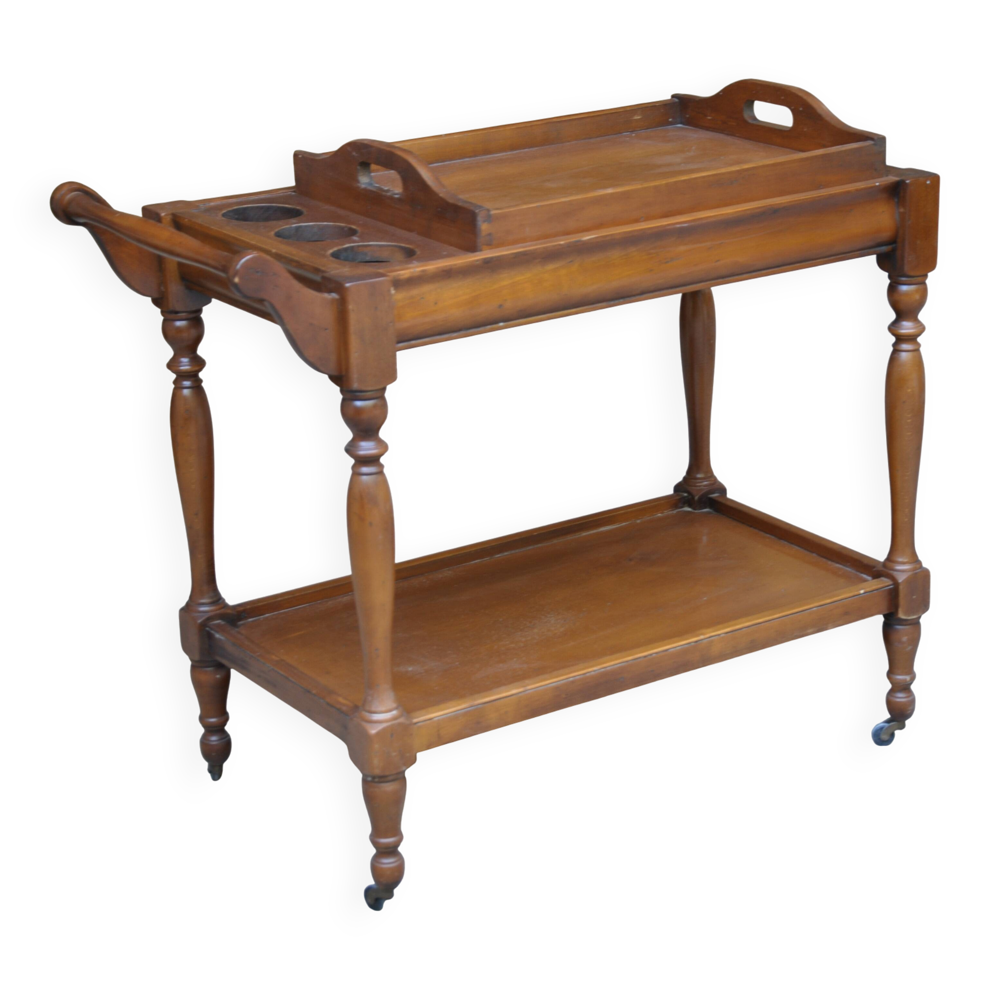 Serving table with a tray, on wheels, made of solid exotic wood.