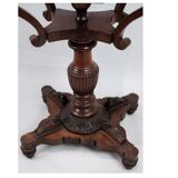 Antique mahogany sewing table on a pillar from around the year 1840s