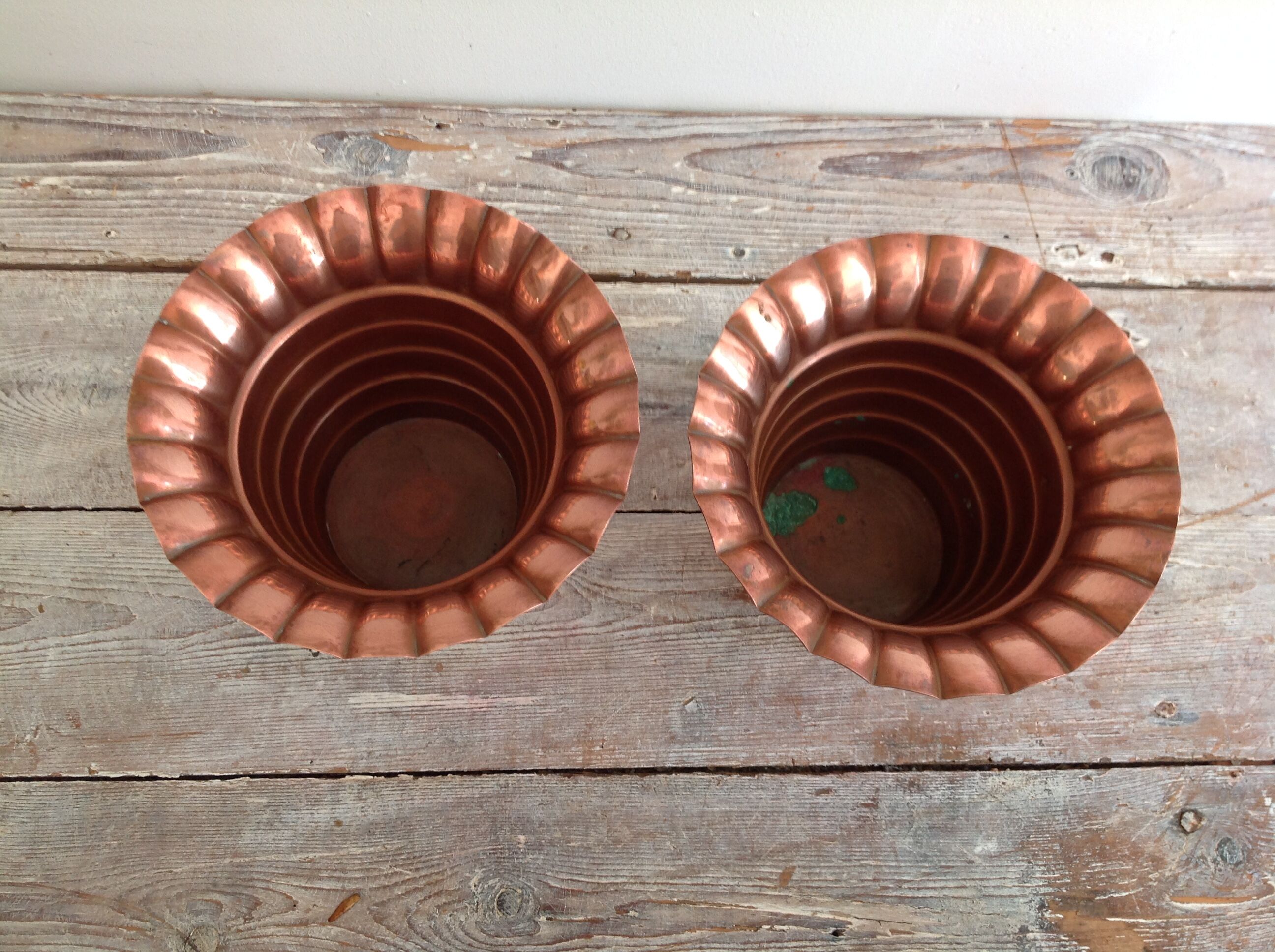 Duo of cache copper pots