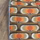 1970 orange pattern / chaise longue / vintage camp bed in metal and fabric