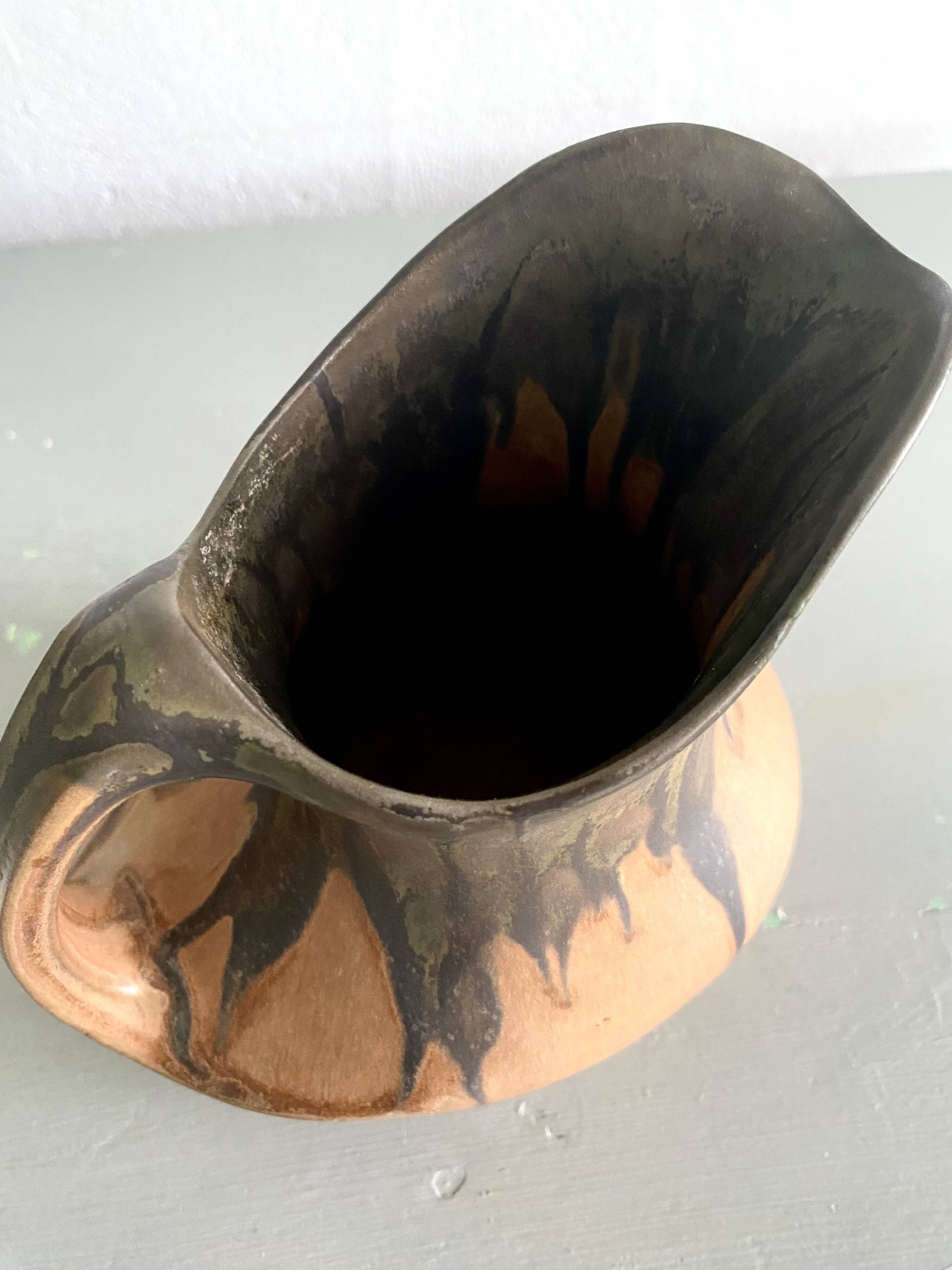 Denbac pitcher, flamed terracotta, 1900