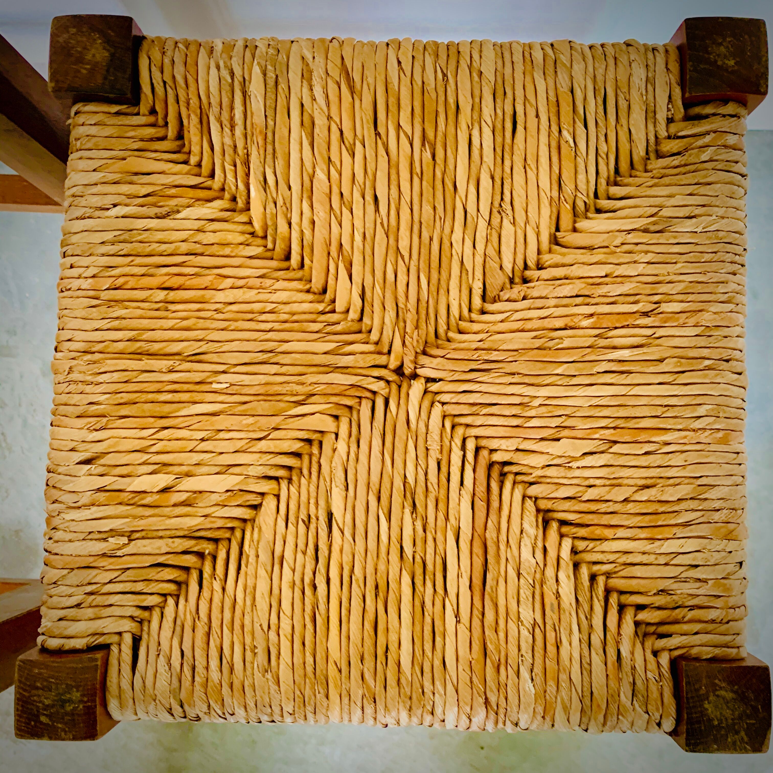 Two light wooden stools varnished and mulched seat