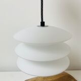 Corrugated opaline suspension