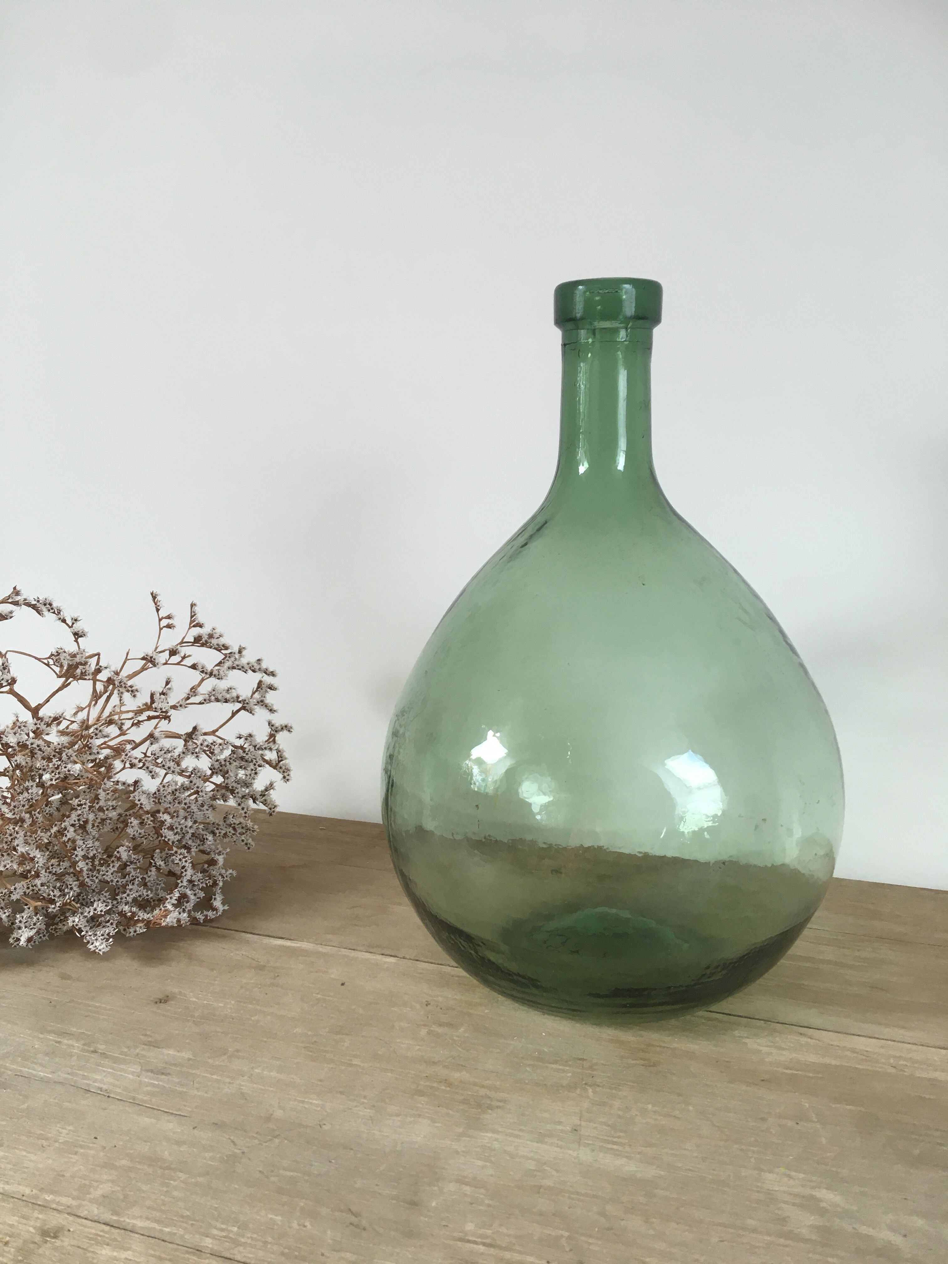 Vintage green demijohn