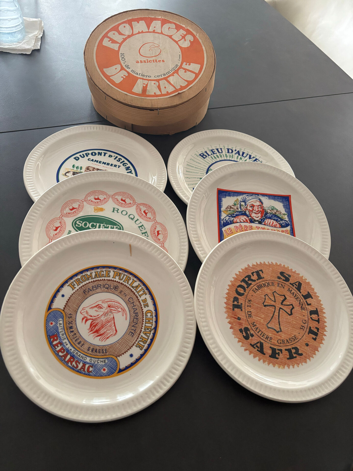 6 ceramic cheese plates from St Armand, France, in their box.