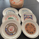 6 ceramic cheese plates from St Armand, France, in their box.