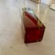 Small red vase made of Murano glass.