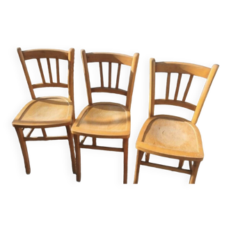 3 vintage bistro chairs in solid wood. Numbered