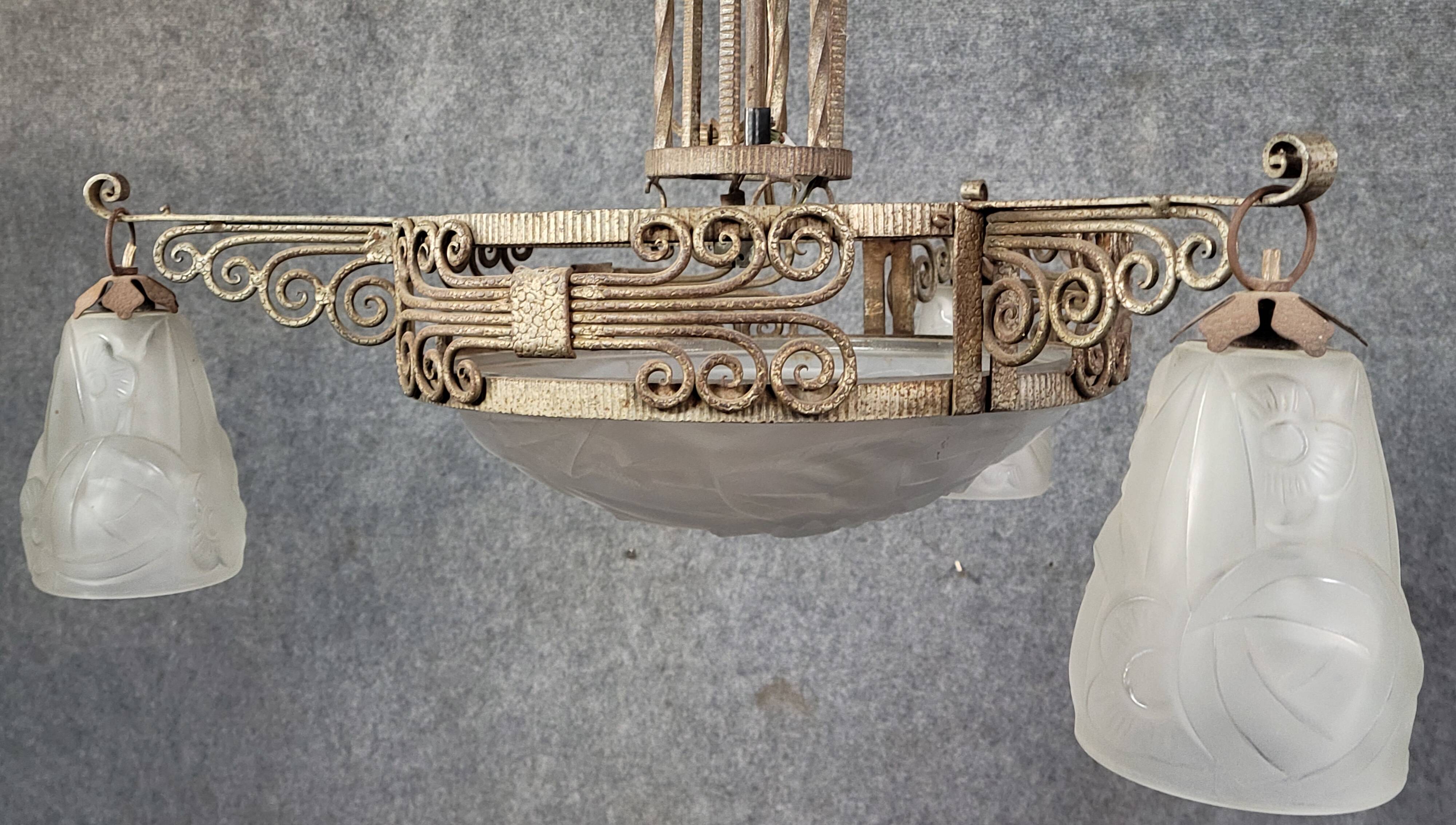 Large Art Deco chandelier, made of finely wrought wrought iron.