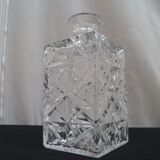 A molded Crystal whiskey decanter