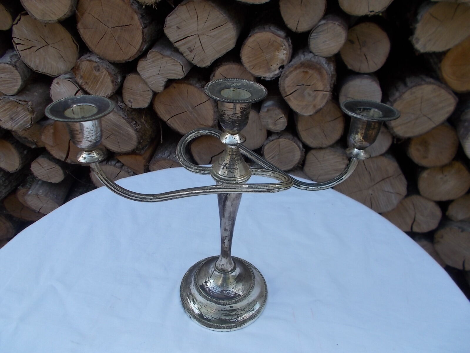 Patinated silver candlestick