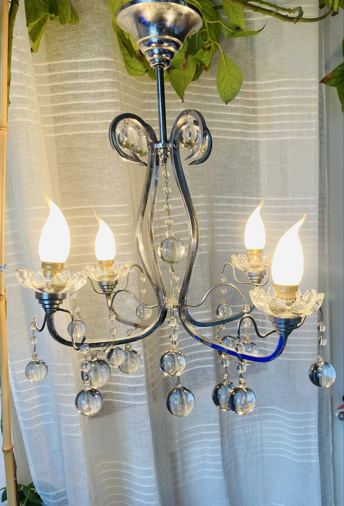 Art Deco chandelier from the early 20th century in chrome brass, with glass pendants.