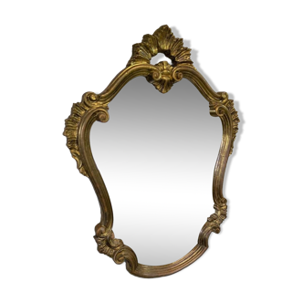 Grand miroir doré style baroque.