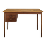 Scandinavian teak desk with a suspended drawer unit.