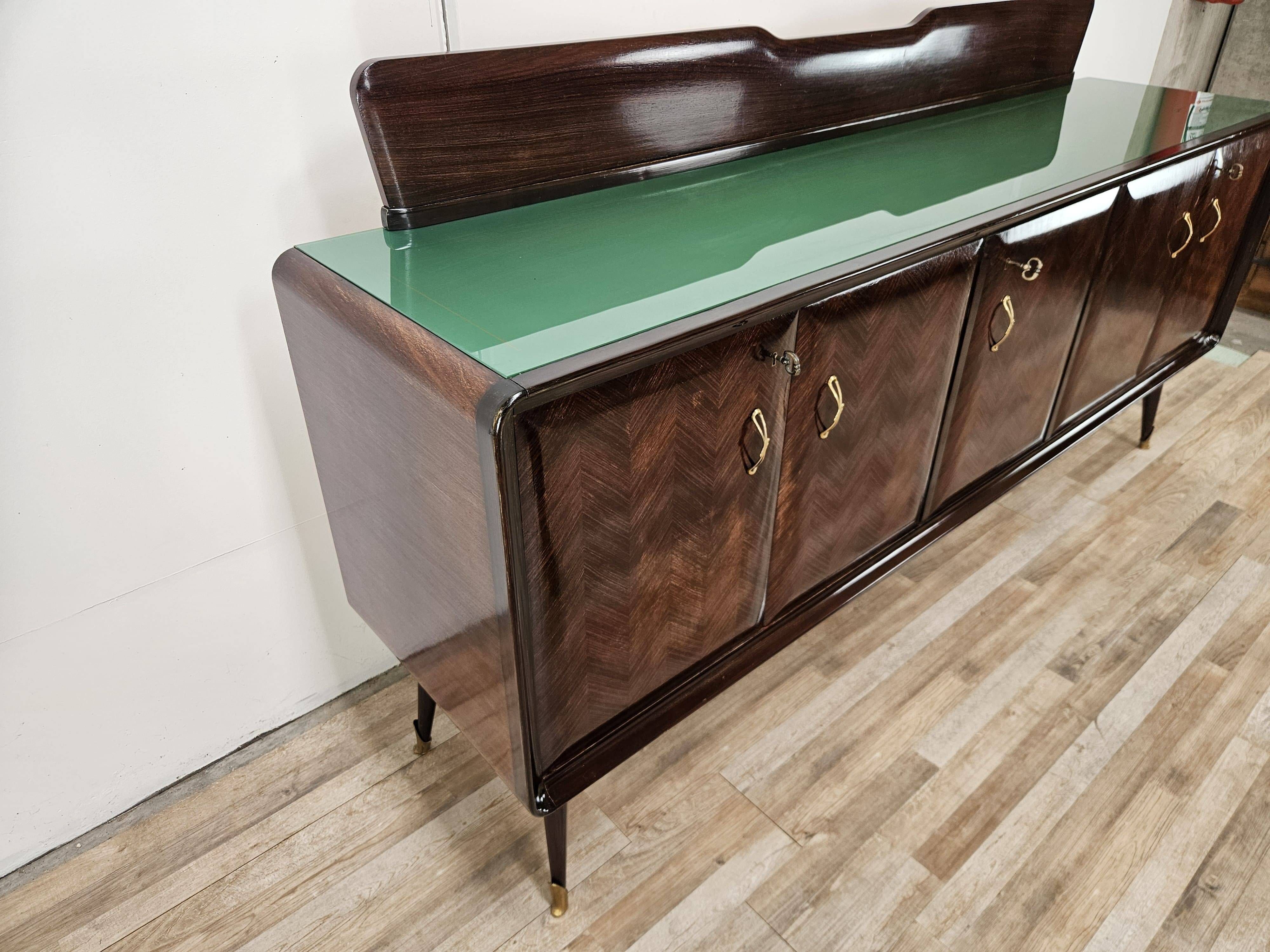 Mahogany sideboard with a glass top, 1960