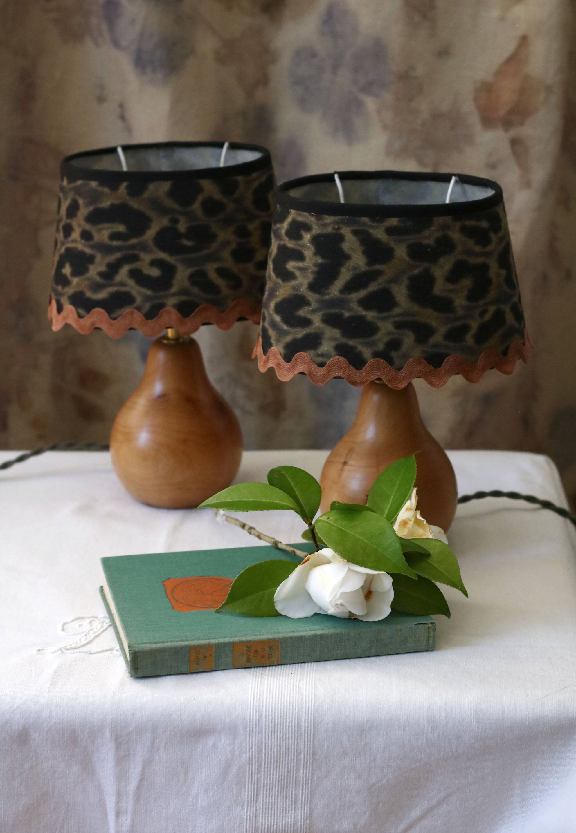 Pair of pear wood bedside lamps with leopard shades