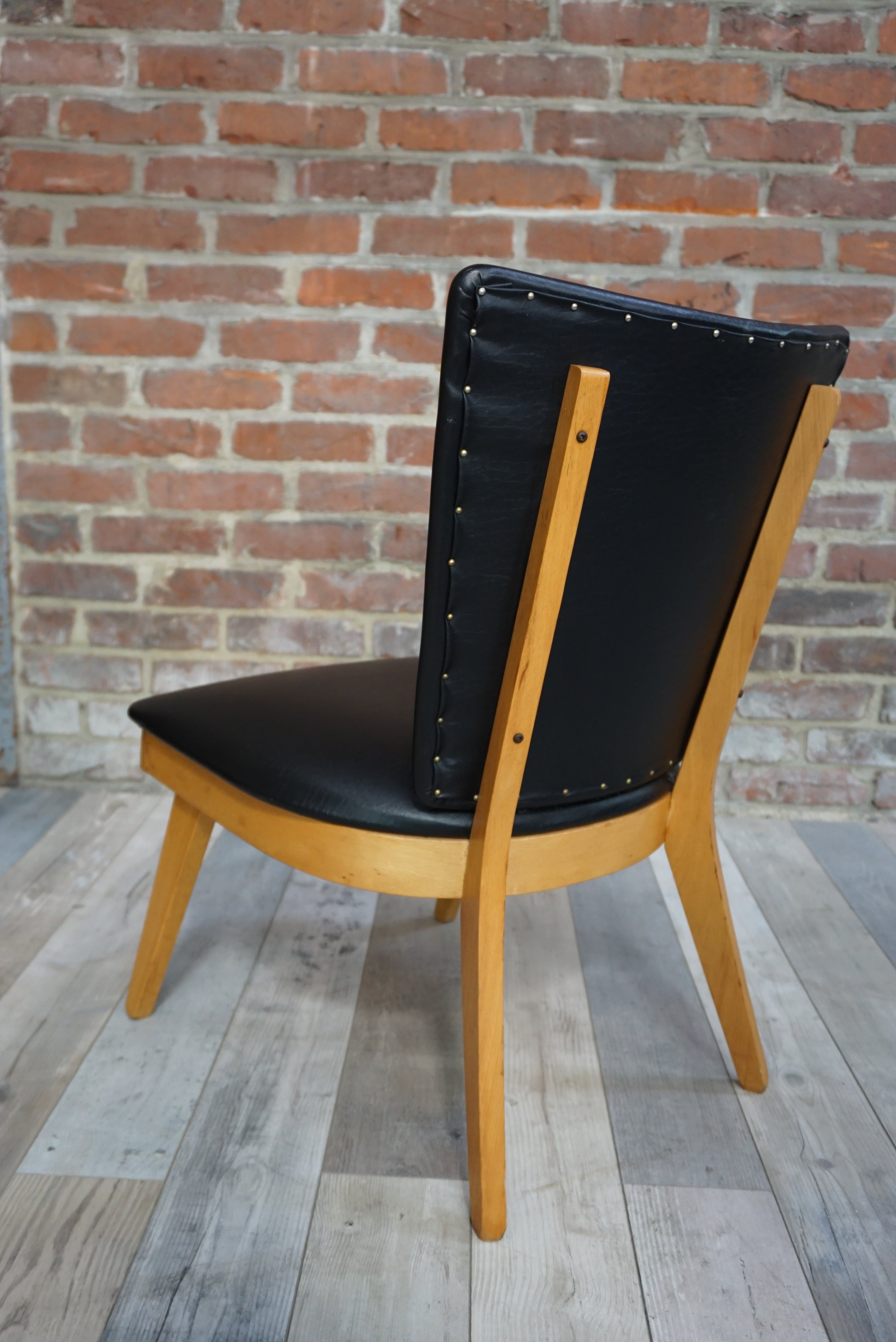 Chair 50 years in wood and faux black leather cocktail
