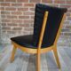 Chair 50 years in wood and faux black leather cocktail