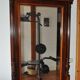 Grand miroir mural en acajou marron sculpté style classique XIXe siècle, glace d'origine
