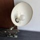Old extendable accordion lamp in celadon green, workshop spirit.