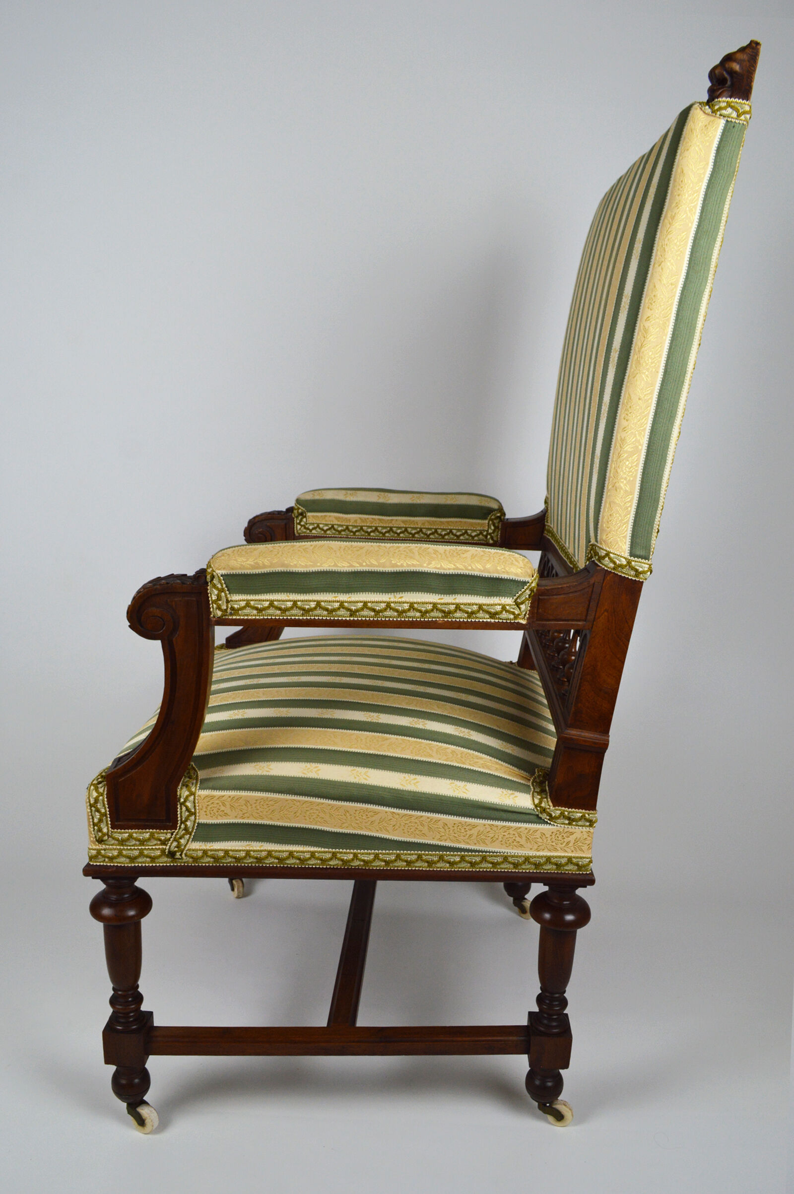 Neo-Renaissance walnut armchair with lion heads, circa 1880