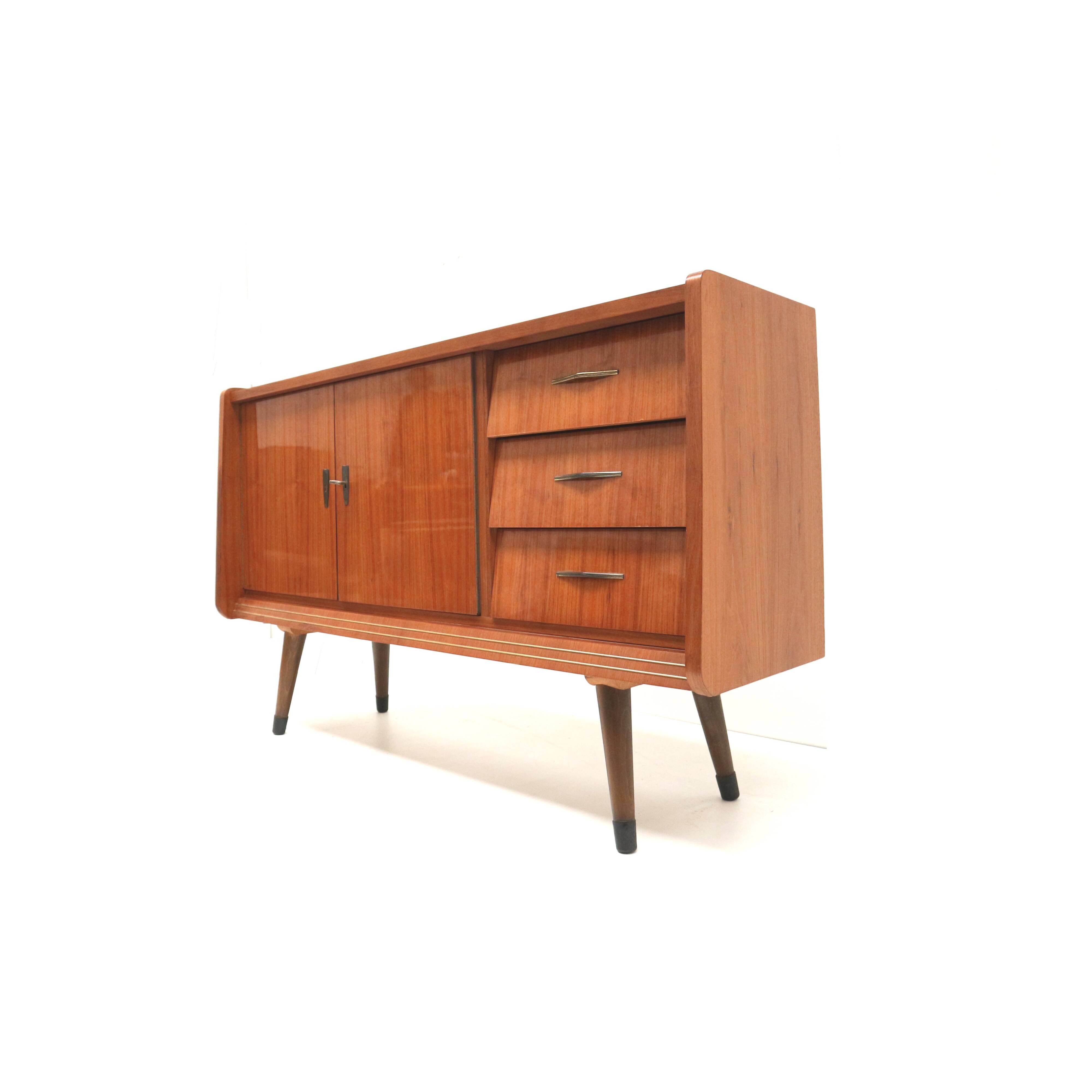 Vintage sideboard with drawers and doors made in the 50s