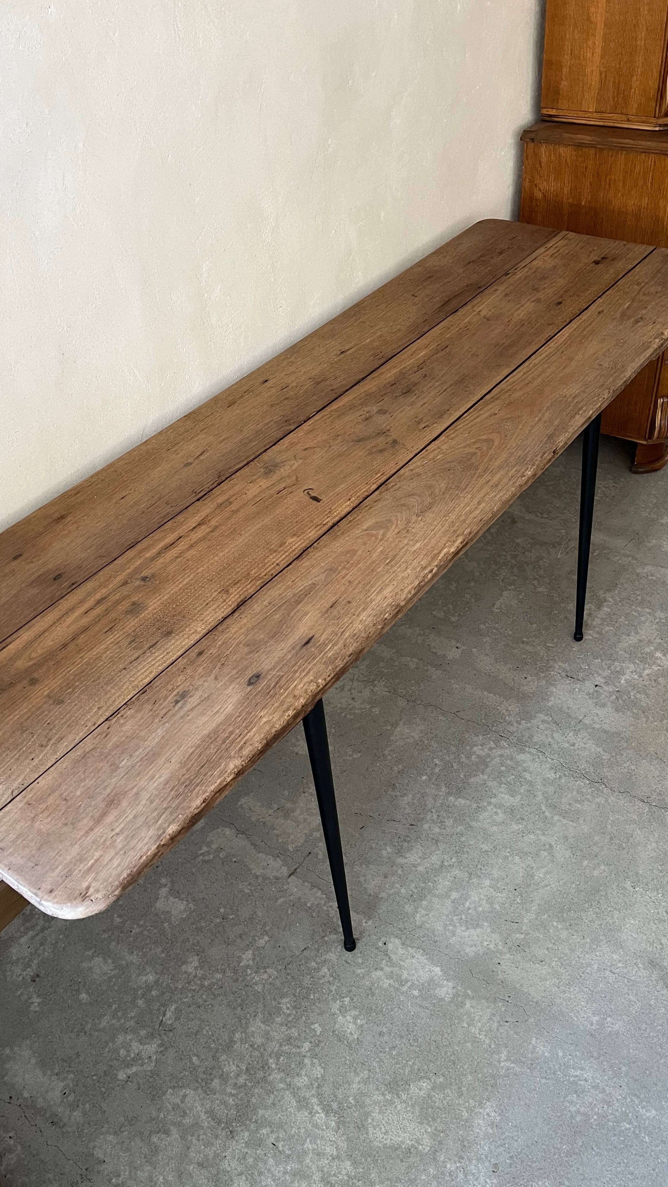 Wooden table, black metal legs