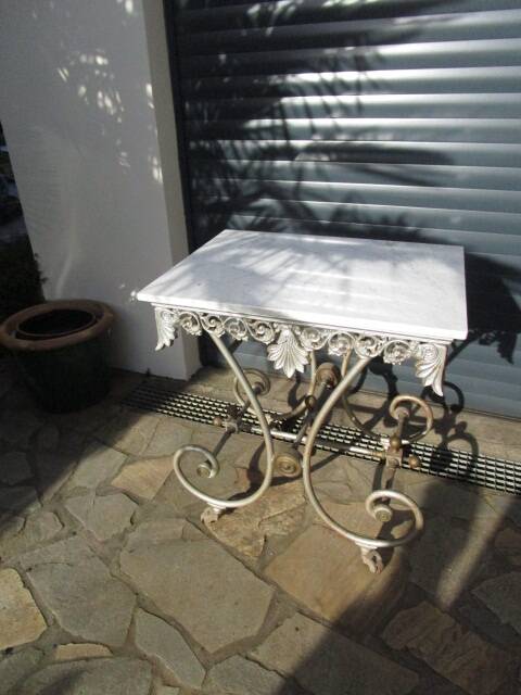 Butcher's table from the late 19th century, wrought iron, brass, and marble.