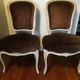 A pair of Louis XV style armchairs in wood and velvet fabrics