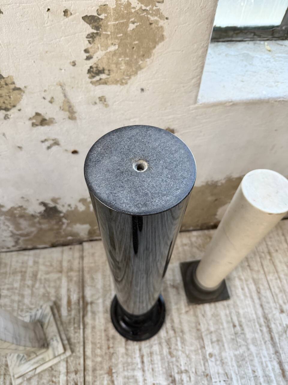 Set of 4 marble columns or pedestals.