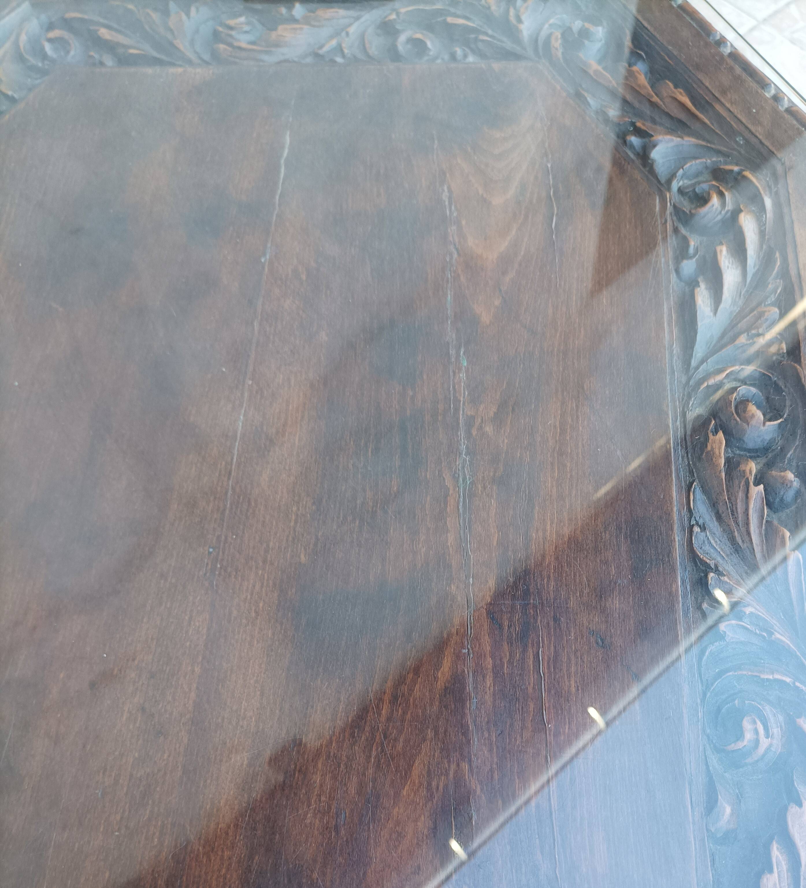 Art Deco style coffee table in carved natural wood