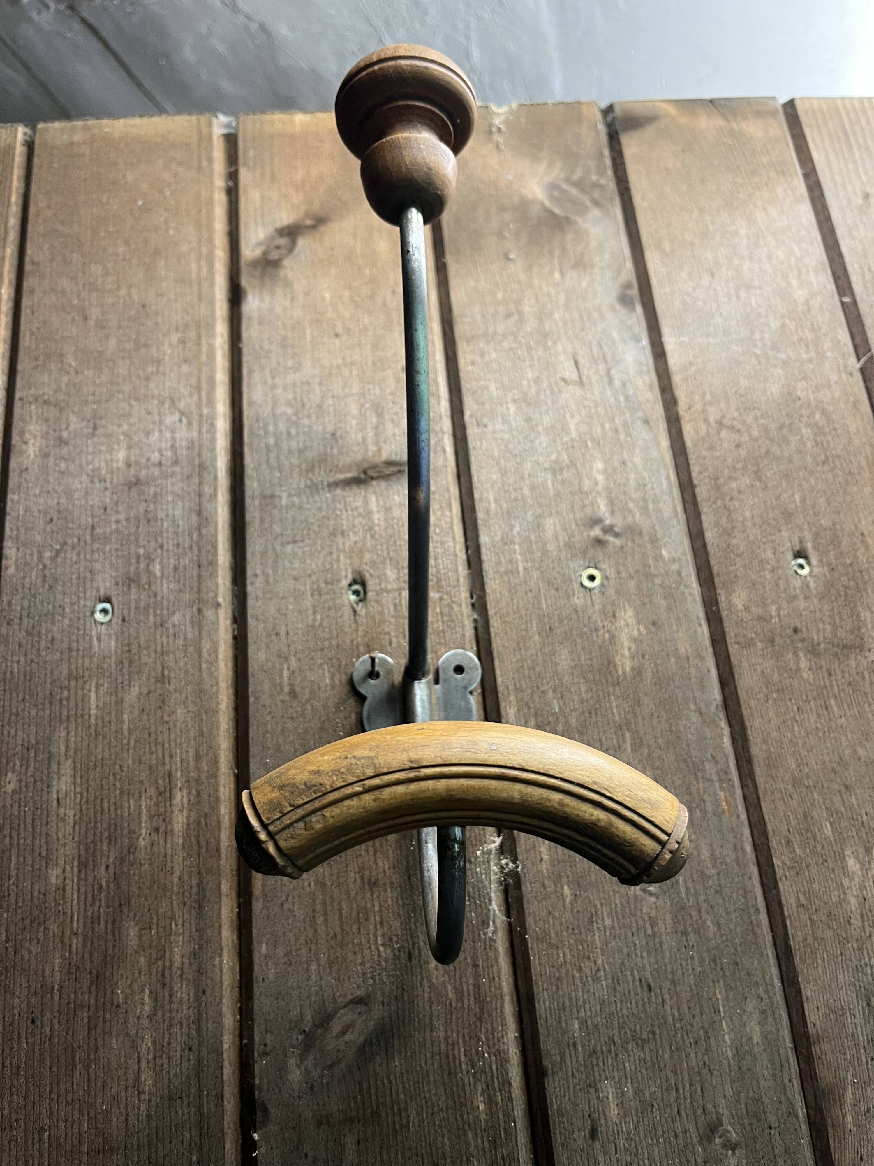 Set of 4 wooden and iron coat hooks from the 60s
