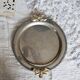 Vintage round silver metal serving tray with gold knot handles