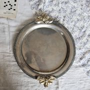 Vintage round silver metal serving tray with gold knot handles