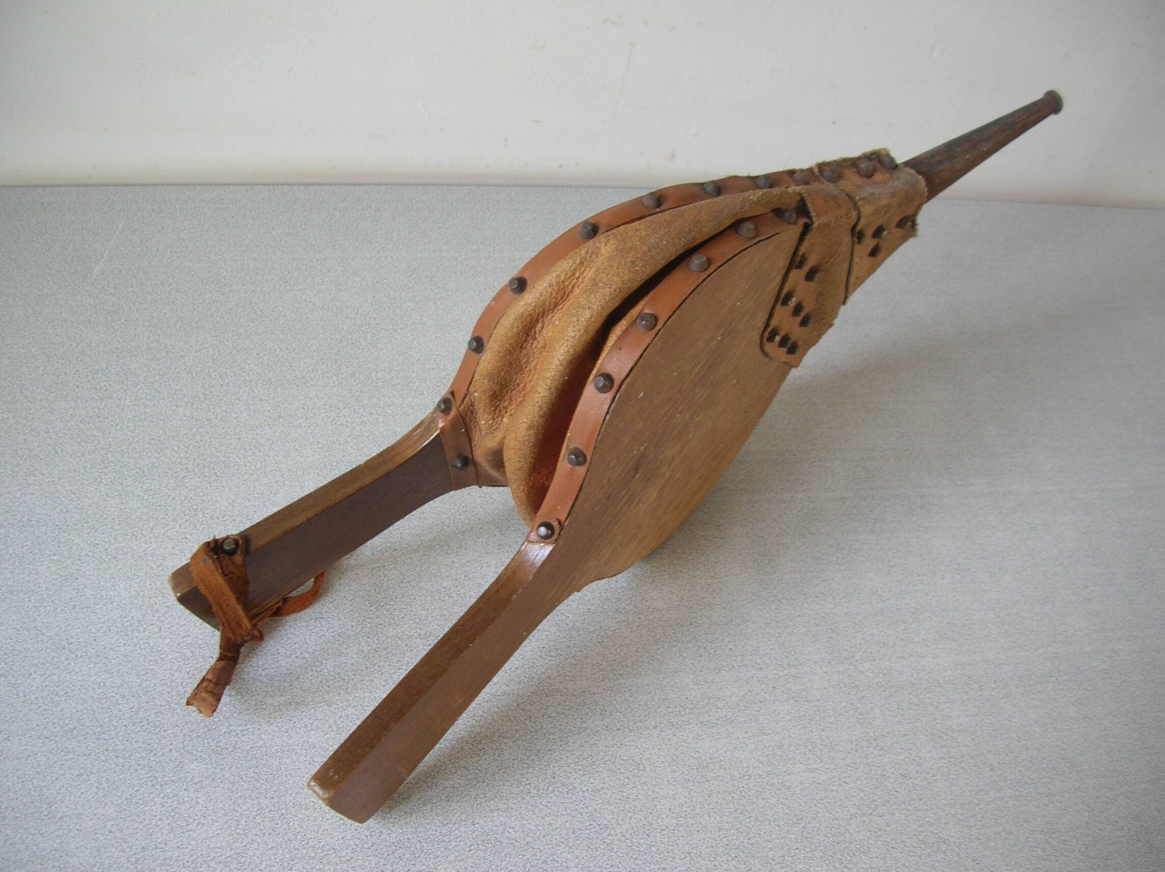 Old wooden and leather fireplace bellows works tool accessory