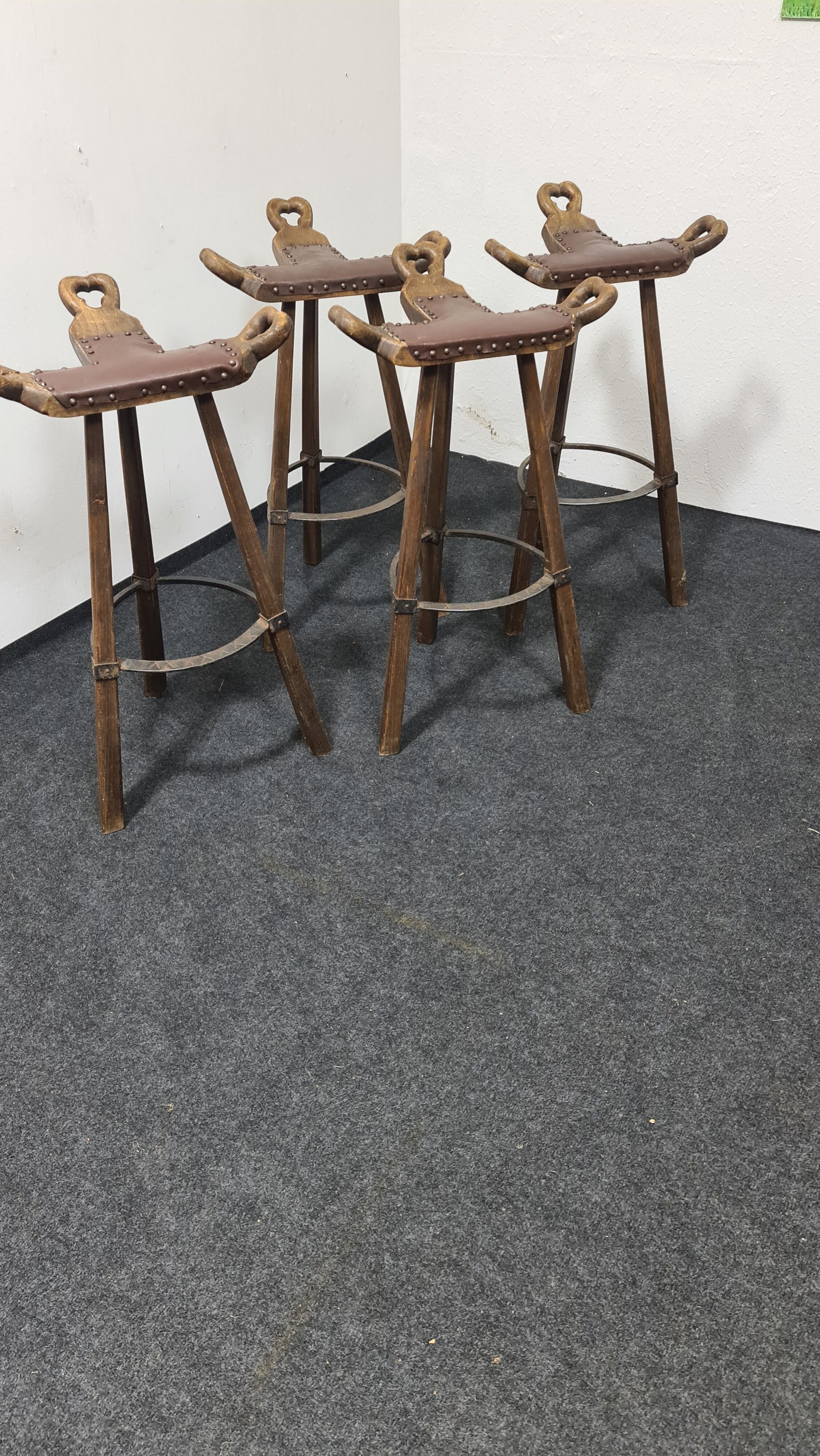 A set of four vintage Spanish Bar stool
