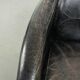 Black vintage cowhide aviator design armchair with characterful appearance